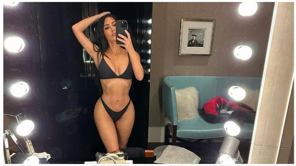 Kim Kardashian Raises Heat In Chilly Winter In Black SKIMS Swim Suit- See Pics