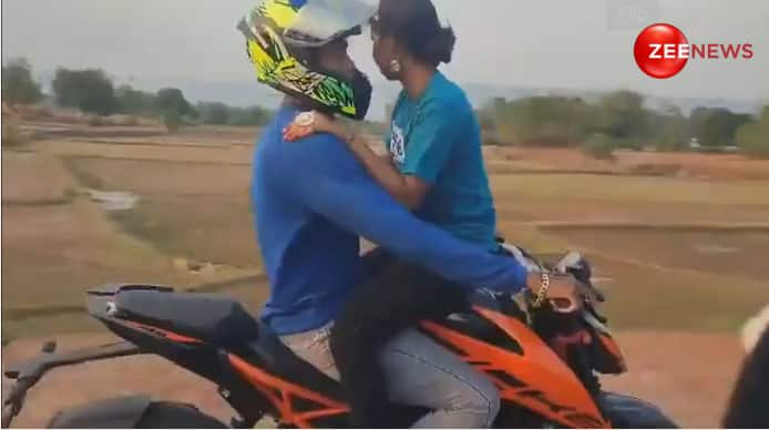 Couple's Intimate Romance On Bike Sparks Concerns In Viral Video ...