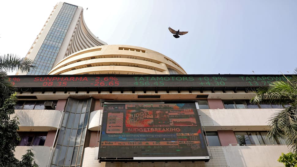 Sensex, Nifty Settle Almost Flat Amid Volatile Trade 