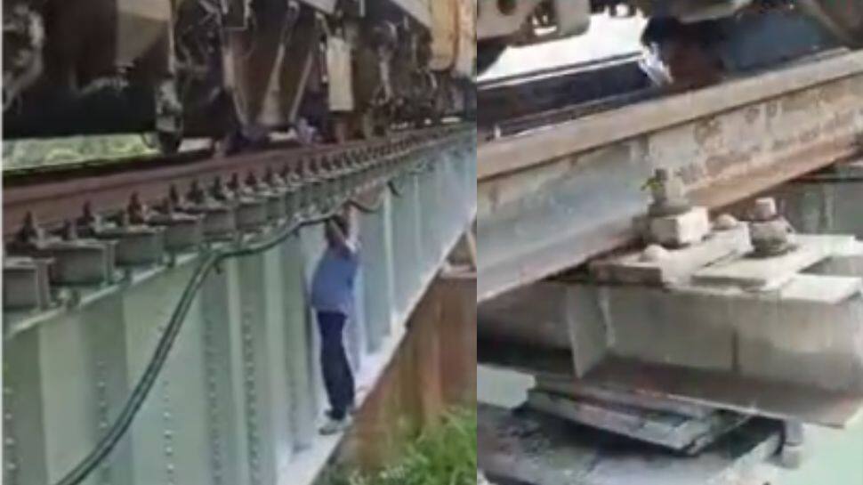 Railway Workers Risk Lives To Fix Train Leak, Viral Video Sparks Debate