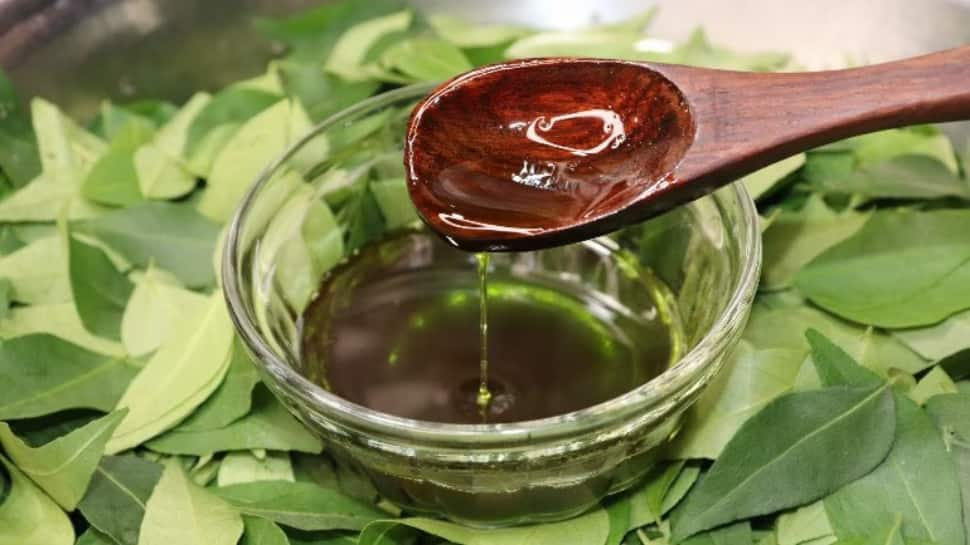 Coconut Oil And Curry Leaves 