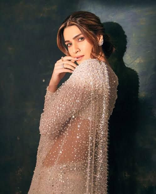 Kriti Sanon’s Ethereal White Sheer Shimmery Saree