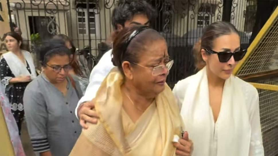 Malaika Arora Holds Her Tears As She Walks Along With Her Mom For The Last Rites Of Her Father