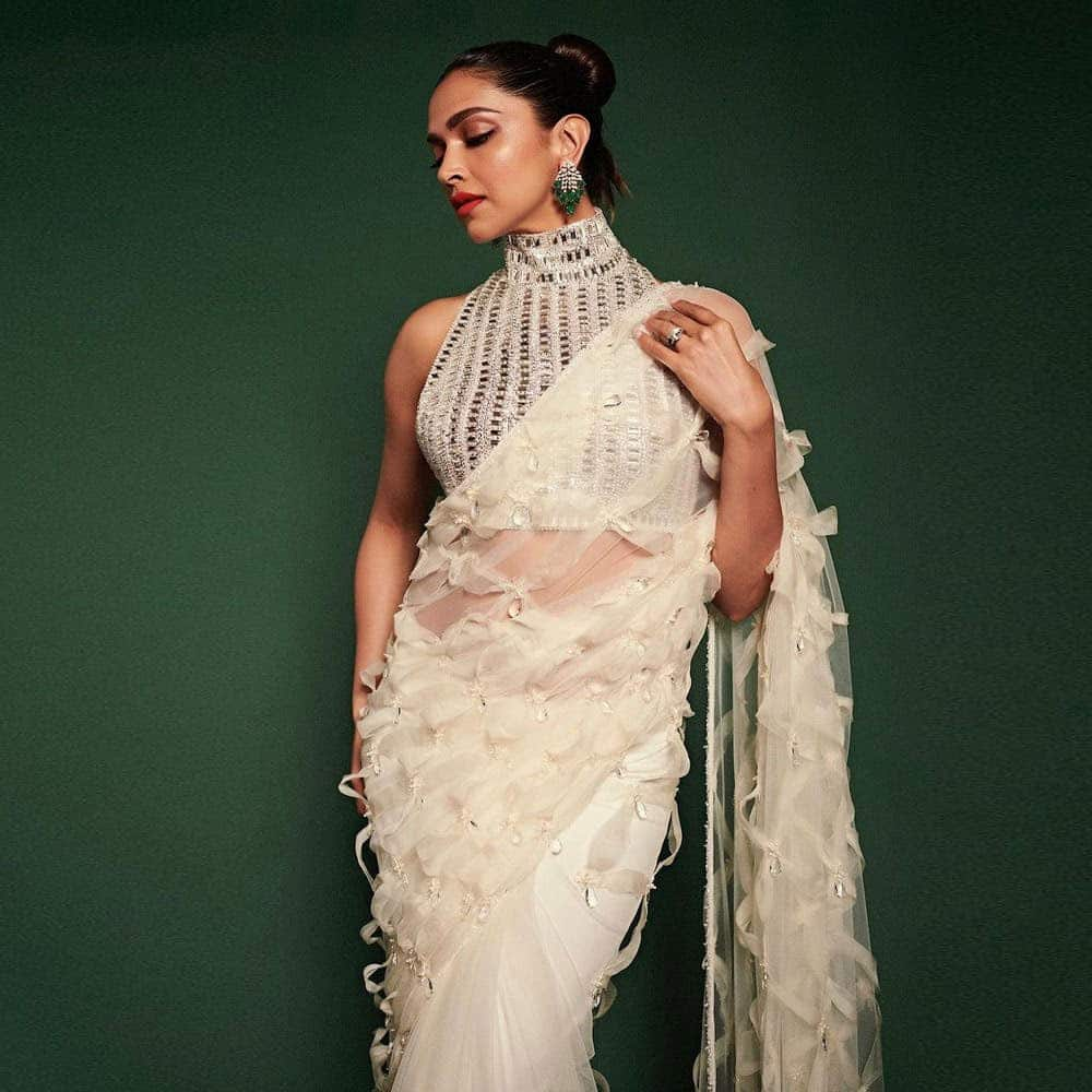 White Ruffle Net Saree with Mirror-Work Blouse