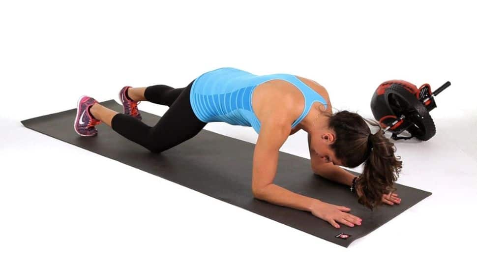 Plank with Knee Taps