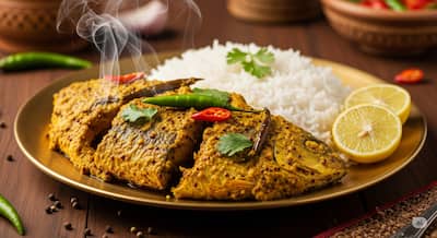 Shorshe Bata Maach (Fish in Mustard Paste):