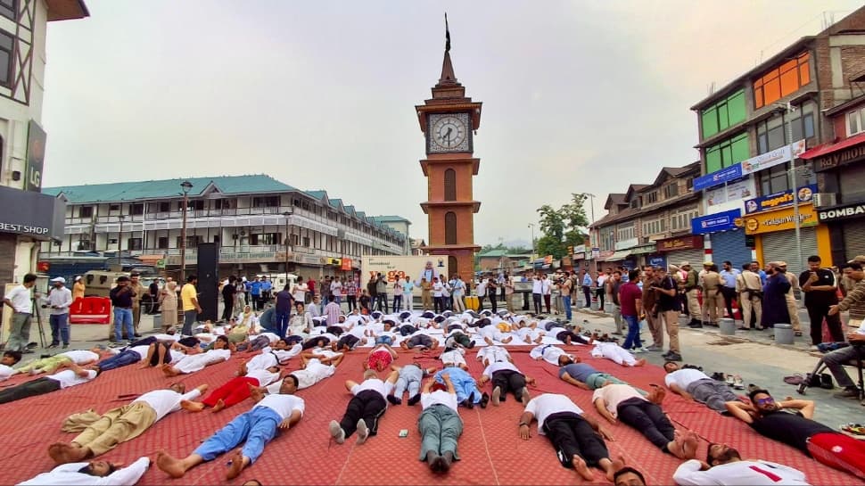 From Separatism To Serenity: Lal Chowk Hosts Grand Yoga Day, Signifying Kashmir's New Chapter From Separatism To Serenity: Lal Chowk Hosts Grand Yoga Day, Signifying Kashmir's New Chapter