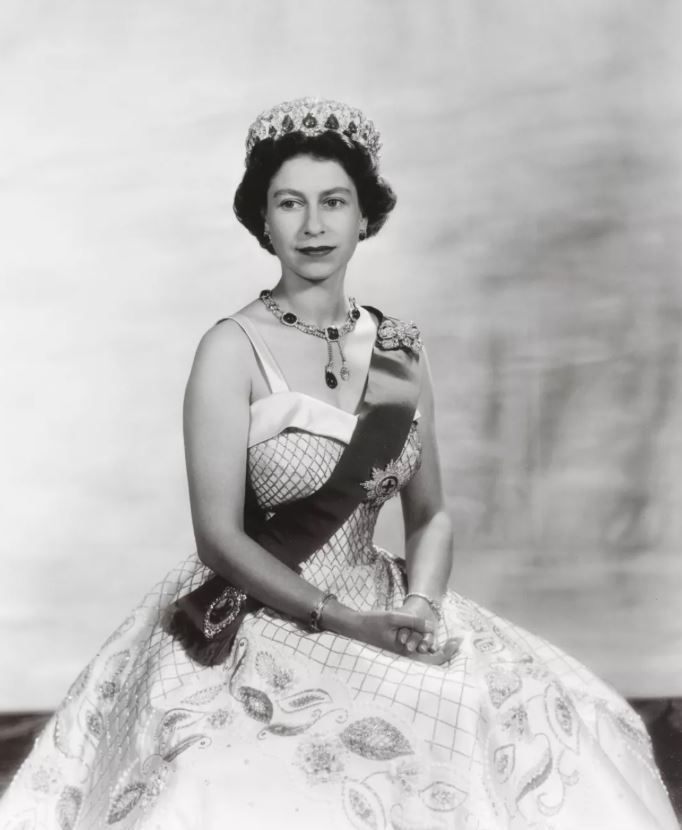 Queen Elizabeth wardrobe display, Buckingham Palace fashion show, Queen Elizabeth dresses, royal clo
