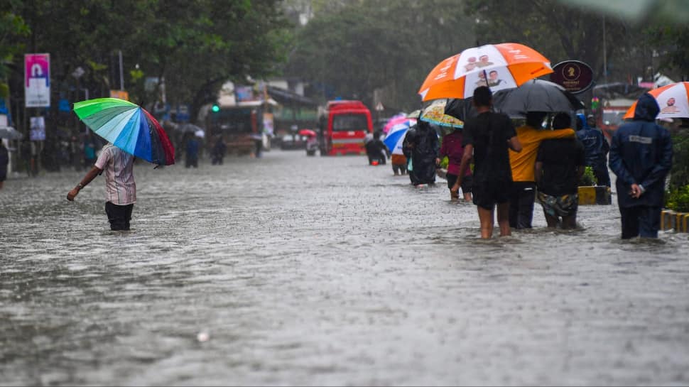 Mumbai`s Weather Riddle: Will Yellow Alert Bring Relief Or More Train Trouble Today? Check Schedule