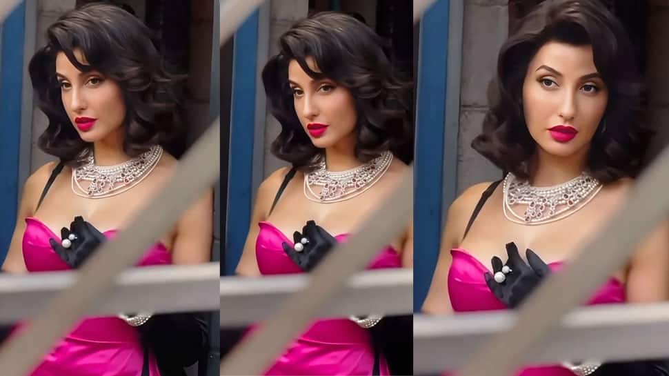 Nora Fatehi Gives Modern-Day Marilyn Monroe Vibe In Pink Bodysuit & Dramatic Curls From What Do I Know First Glimpse - Watch