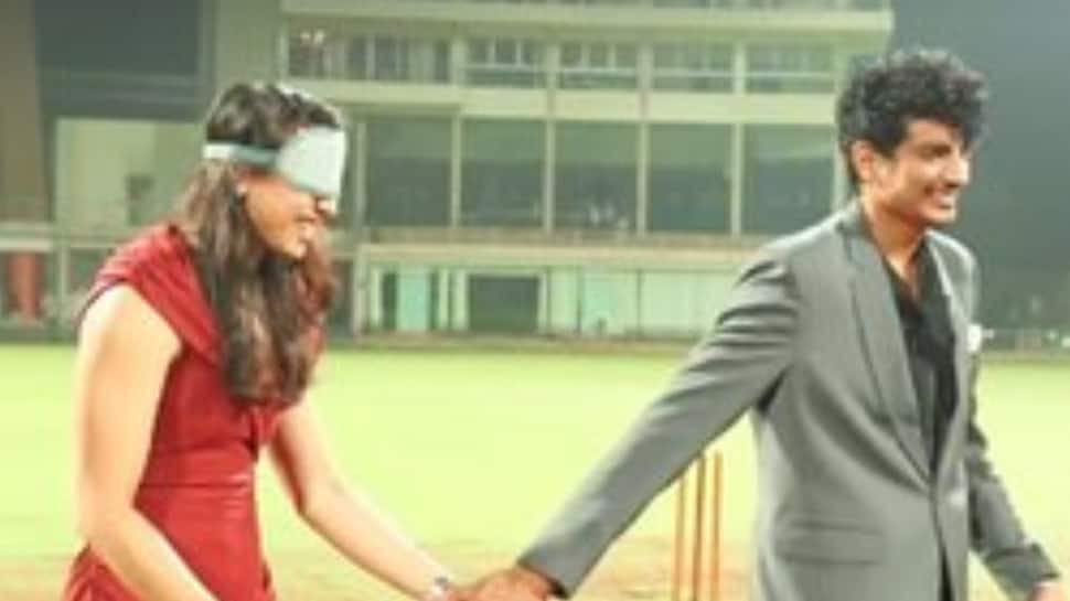Down on One Knee Under Floodlights