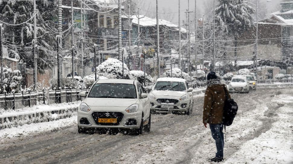 J-K: Kashmir transforms into a winter wonderland as season`s first snowfall blankets hills and plains