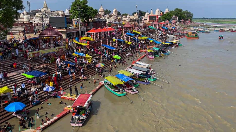 UP: Devotees take holy dip at Saryu Ghat amid chilly weather on Basant Panchami