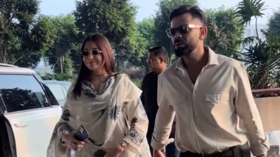 Virat Kohli and Anushka Sharma twin in white as they jet off together from Mumbai airport - SEE PIC
