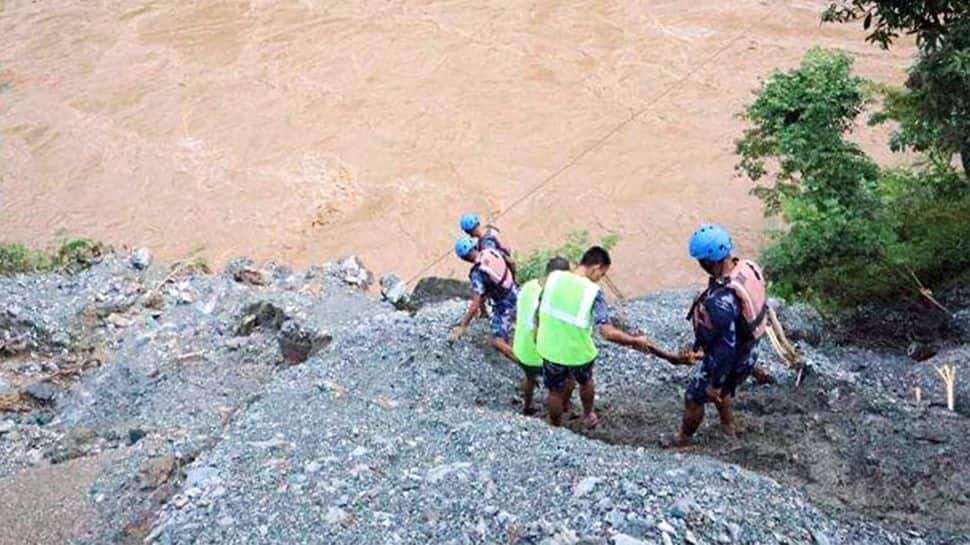 Nepal bus tragedy: Eighteen people killed as bus falls into river in Dhading