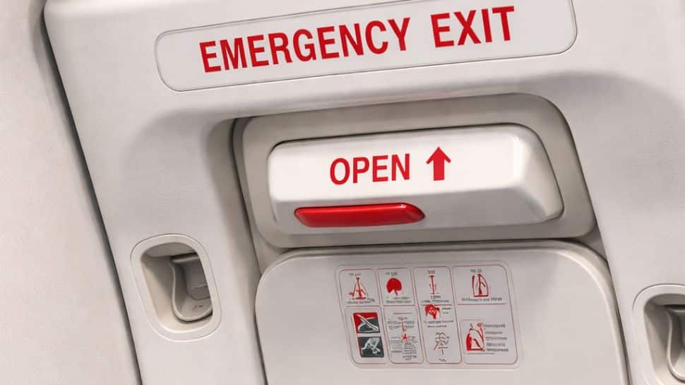 ‘Possessed by ghost’: Man triggers mid-air scare after trying to open emergency door TWICE