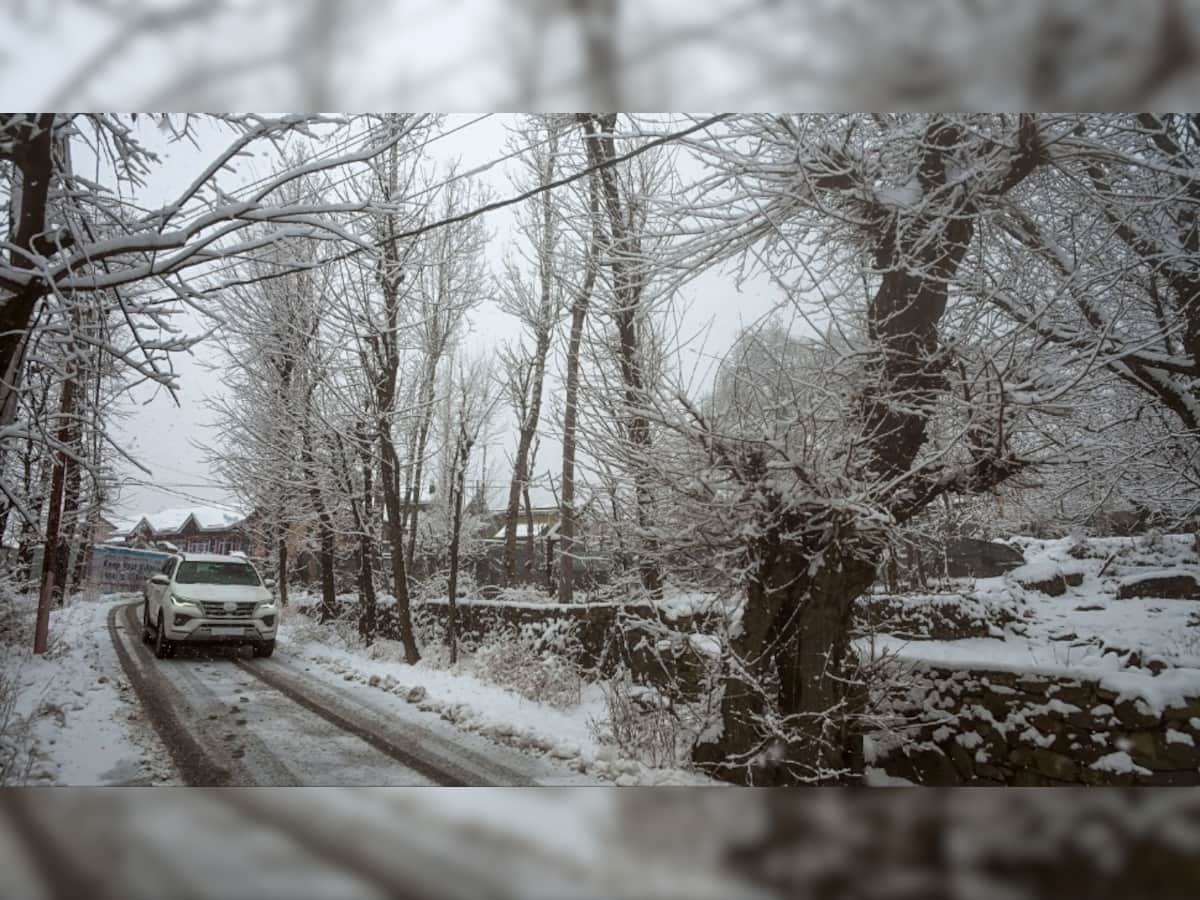 Rains lash Kashmir plains, fresh snowfall in hills; highway shut after landslide