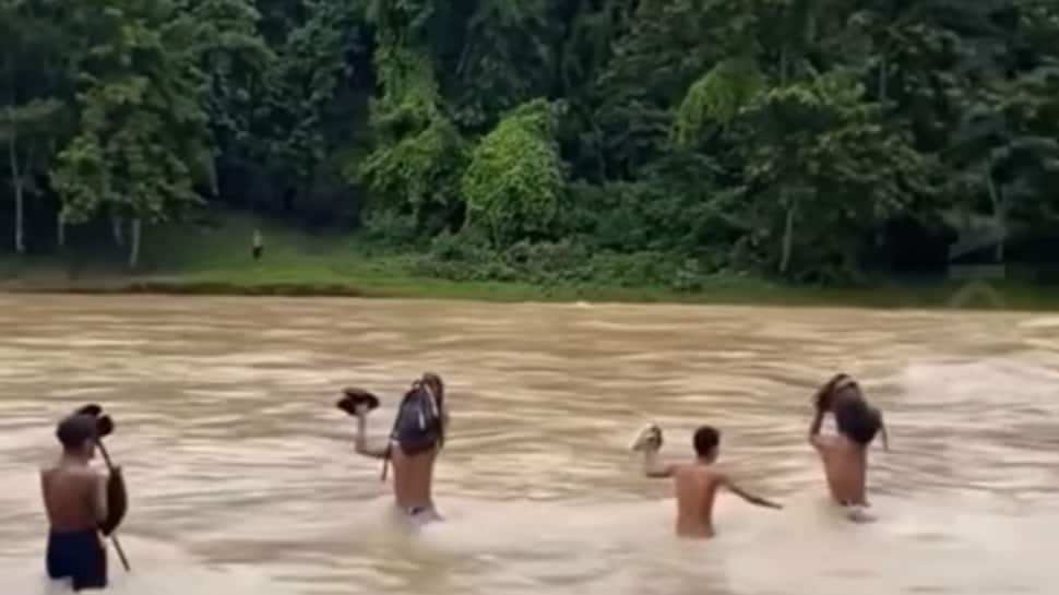 Not a movie scene: Meghalaya children brave strong currents to reach school | WATCH