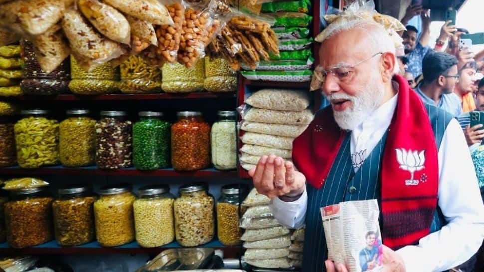 On Bengal campaign trail, PM Modi stops for popular street snack ‘jhalmuri’ in Jhargram