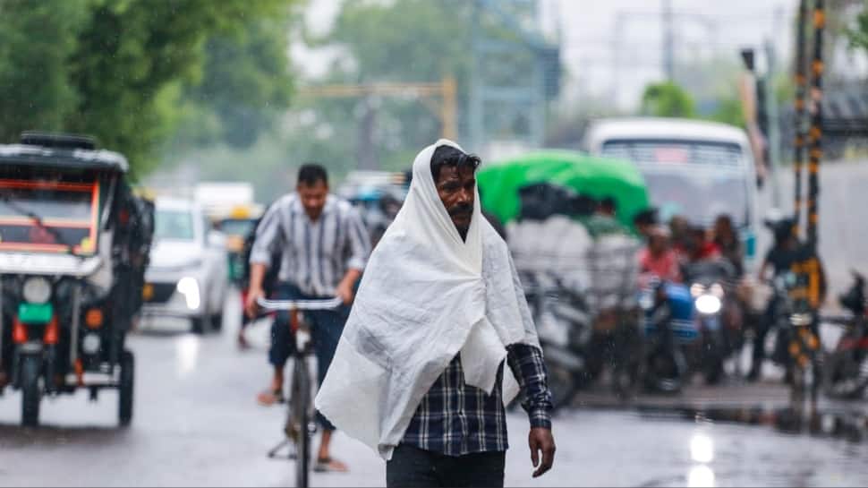 delhi-ncr-weather-update-rain-brings-relief-from-heatwave-imd-heavy-rainfall-warning-14-states