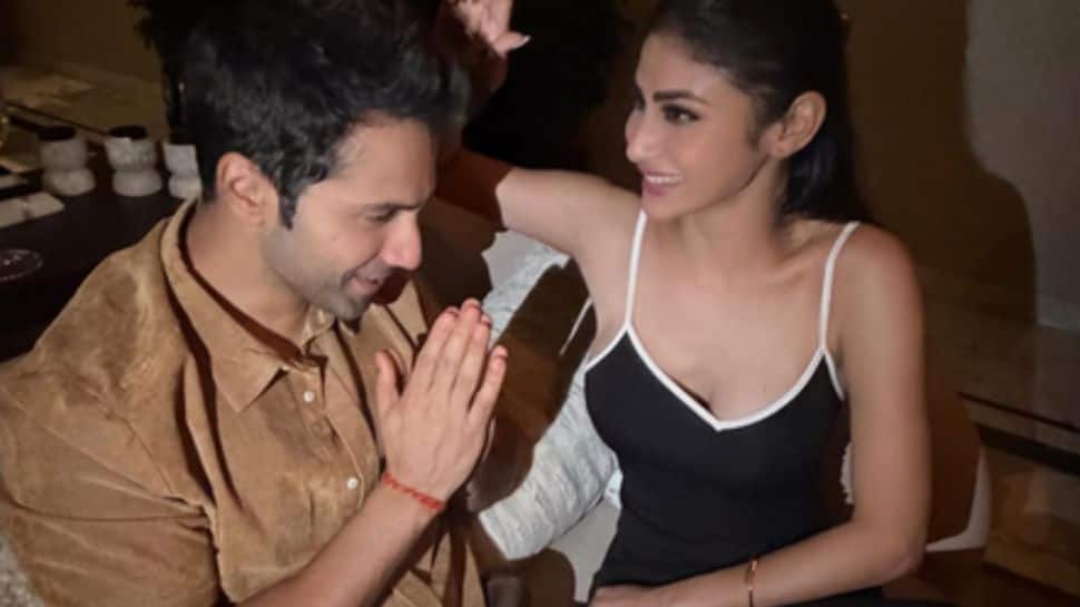 Varun Dhawan bows before Mouni Roy, seeks blessings from his on-screen mother