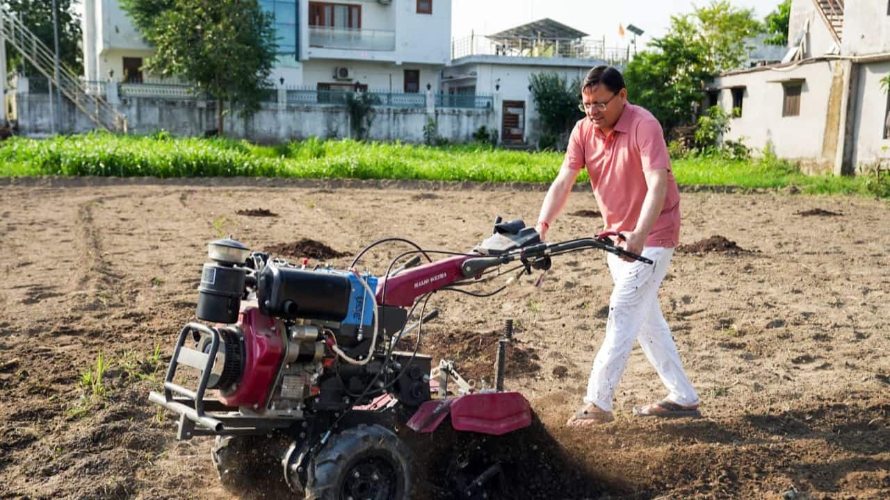 Uttarakhand Chief Minister Dhami operates tiller in field, promotes traditional and organic farming