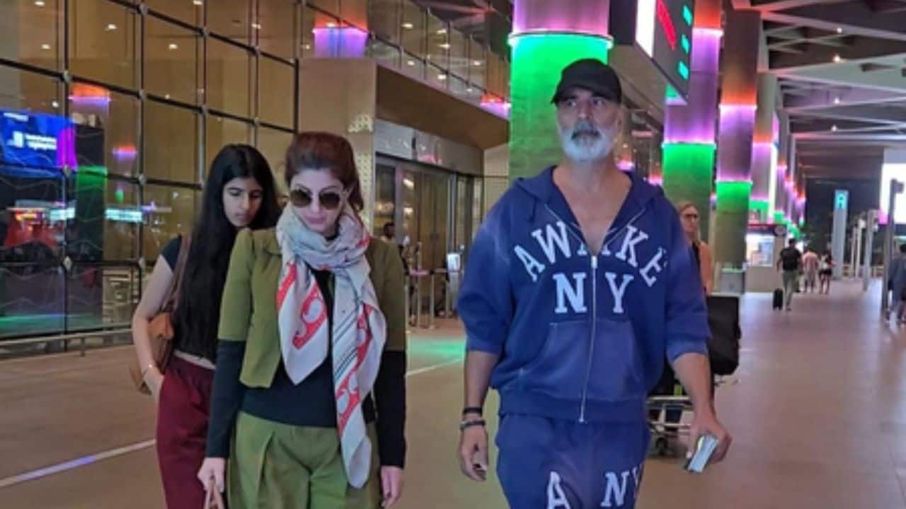Akshay Kumar's daughter Nitara hides behind mom Twinkle Khanna as family returns from London | WATCH