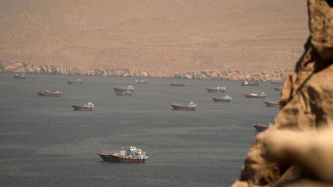 Iran, Oman agree on Hormuz shipping routes; US blockade remains