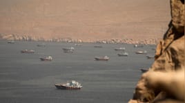 Iran, Oman near Hormuz shipping deal as Trump threatens US control