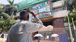 Sensex, Nifty post mild uptick over easing crude prices