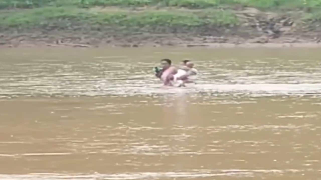 Crossing a raging river with baby: Hero teacher`s terrifying trek goes viral – watch