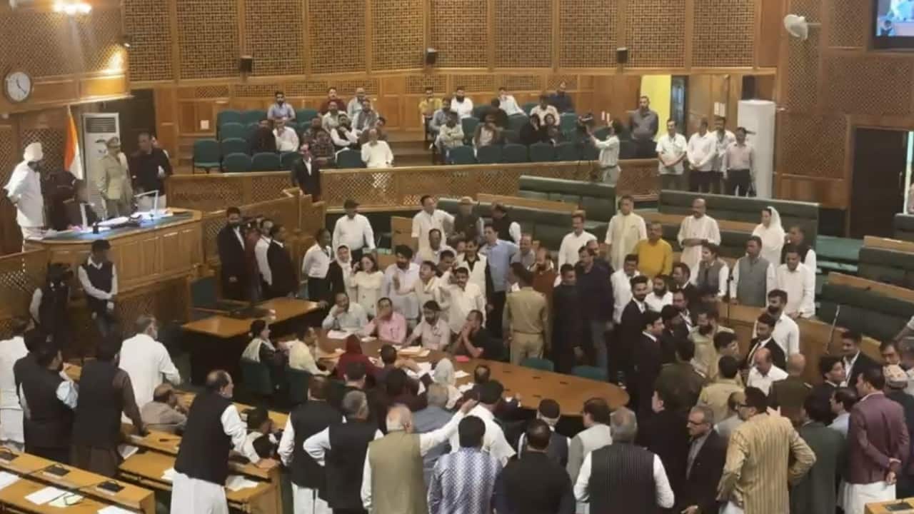 Chaos in J&K assembly: Omar Abdullah moves full statehood resolution; BJP storms over 2000 autonomy reference, tears document