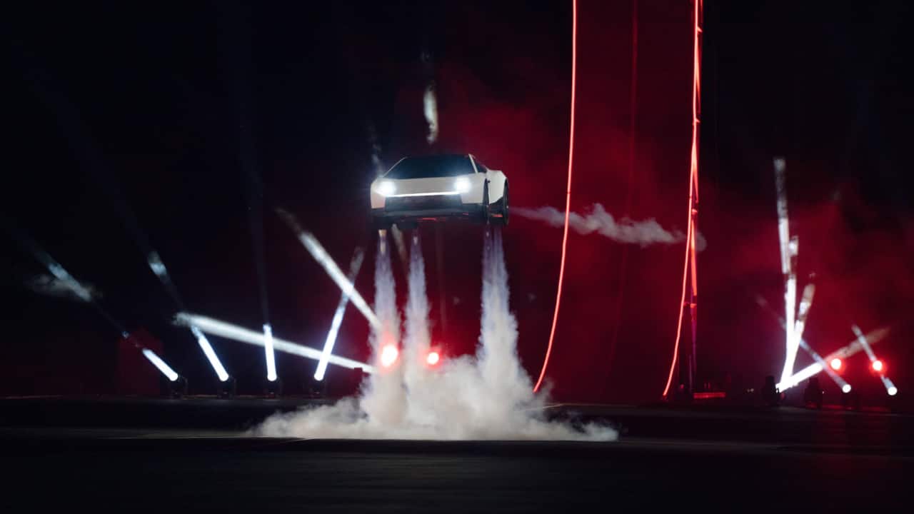 Tesla unveils flying car Roadster with thrusters for mid-air stunts