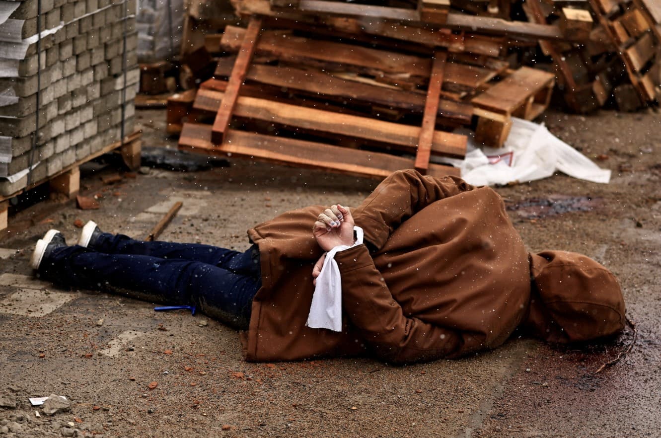 Bodies of civilians lie on the road in Bucha amid Russia's invasion of Ukraine
