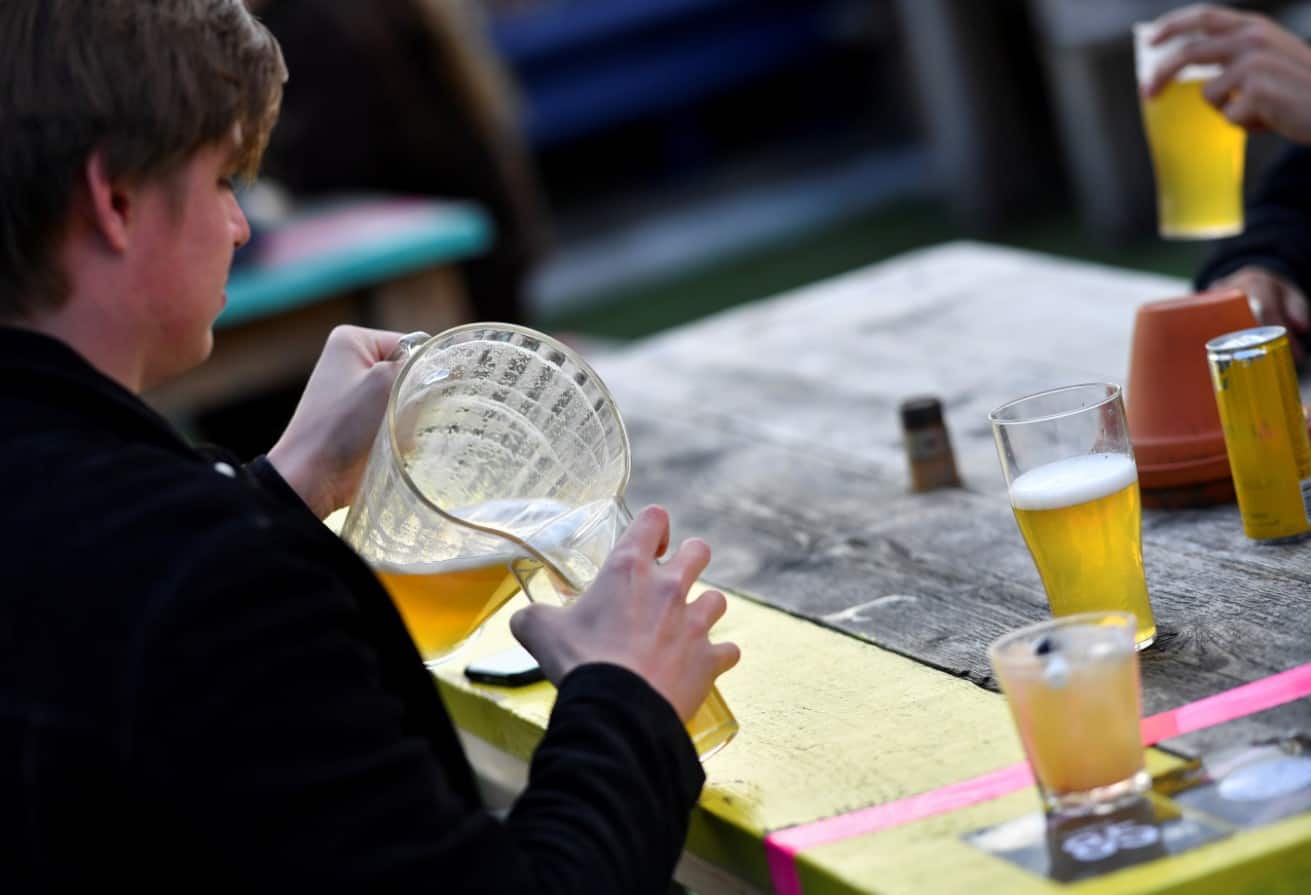 People hit pubs as COVID-19 restrictions ease in UK, drink 6 million pints on first weekend
