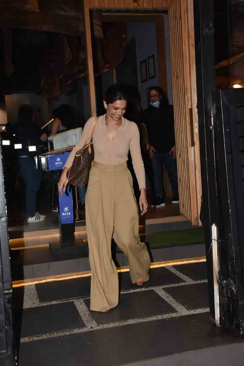 Deepika Padukone Looks Chic In White Top And Striped Pants Check Out The  Divas Stylish Airport Diaries  News18