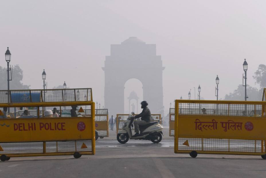 Fog engulfs India Gate amid dense fog on a cold winter morning, in New Delhi on Tuesday