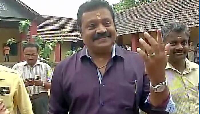 Rajya Sabha MP Suresh Gopi casts his vote at a polling booth in Thiruvananthapuram