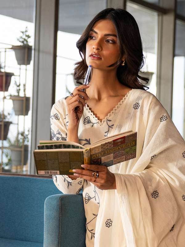 1. Libas Off White Floral Embroidered V-Neck Straight Kurta With Trouser And Dupatta