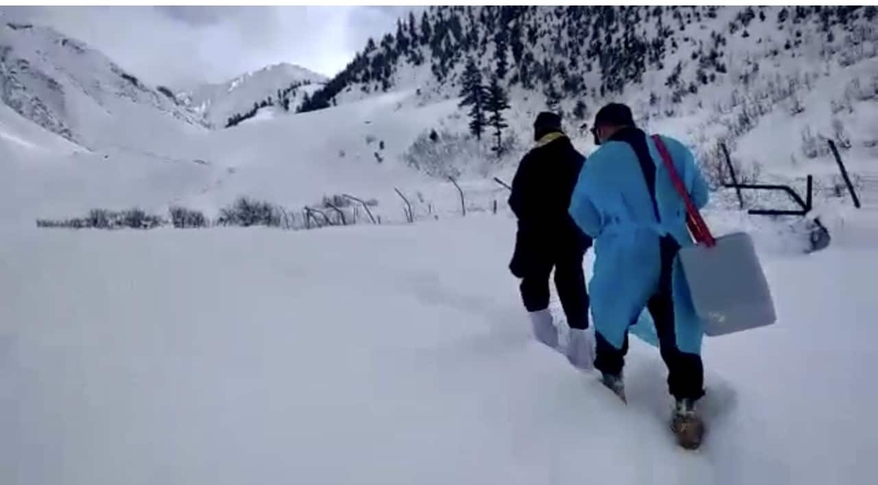 Kashmir health workers are braving snow, cold waves to vaccinate kids in this remote village thumbnail