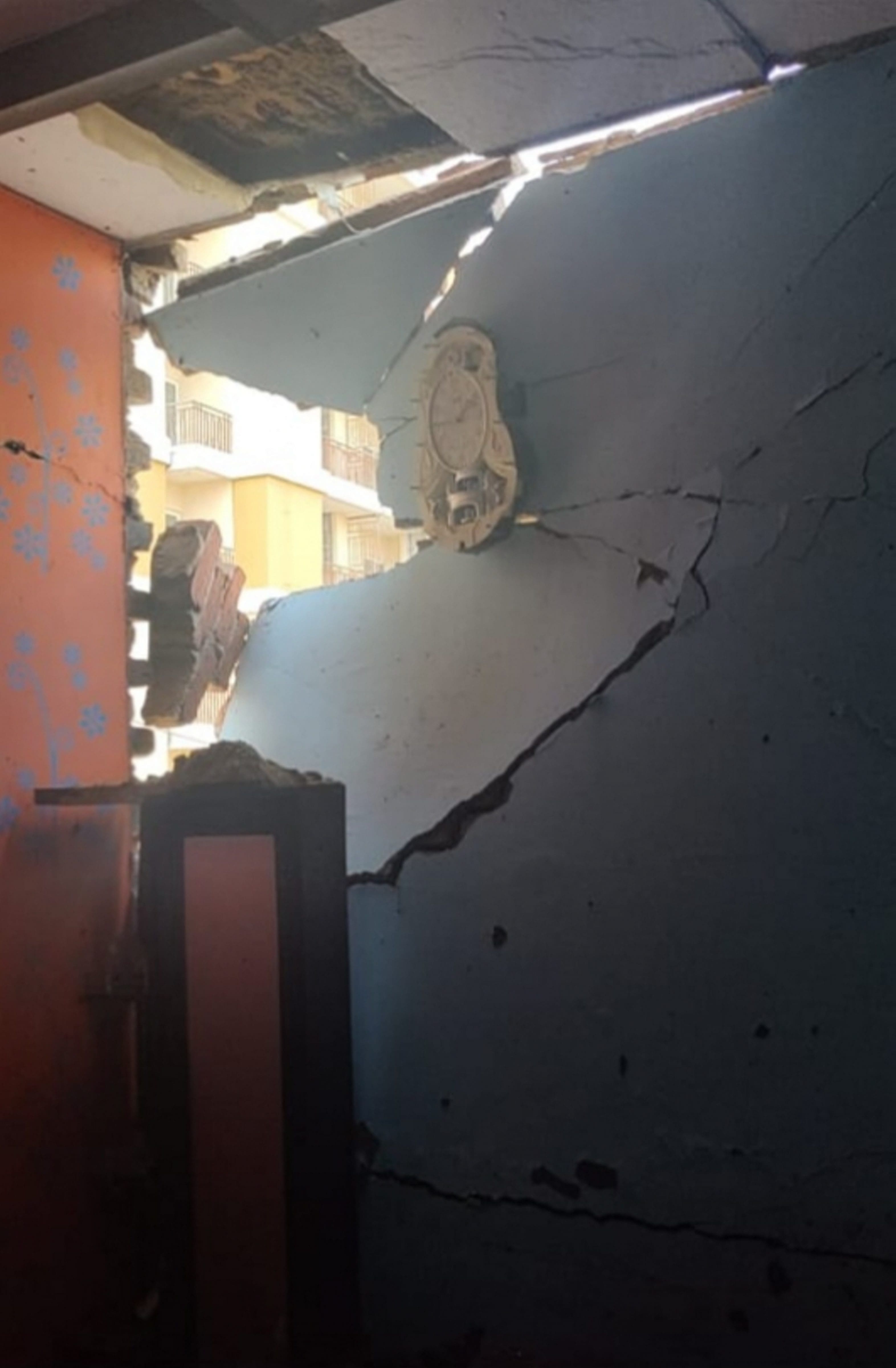 Ghaziabad: Damaged wall after an LED TV exploded in a house, in Ghaziabad