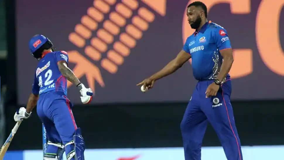 Mumbai Indians all-rounder Kieron Pollard (right) warns Delhi Capitals opener Shikhar Dhawan for stepping out too early out of his crease. (Photo: IPL)