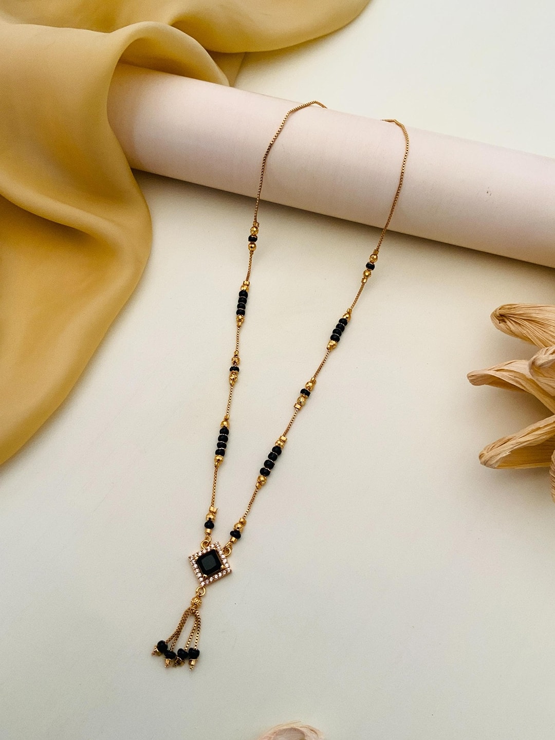 Jazz and Sizzle Gold-Plated Stone-Studded Beaded Mangalsutra With Earrings