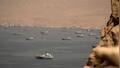 Iran, Oman near Hormuz shipping deal as Trump threatens US control