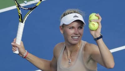 Carolinec Wozniacki reaches US Open final as Peng quits in tears