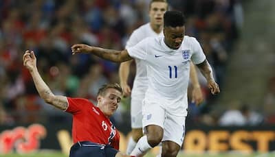 Raheem  Sterling can be England`s Marc​ Overmars - Wayne Rooney