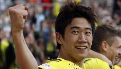 Injuries leave Dortmund counting on Shinji Kagawa