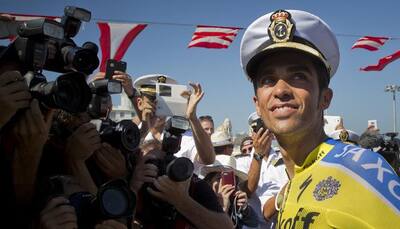 Alberto Contador maintains lead as Hansen claims stage win