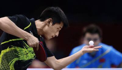 China table tennis coach puts heat on Olympic champ Zhang Jike