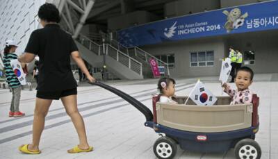 Thousands flood in ahead of Incheon Asian Games gala opening